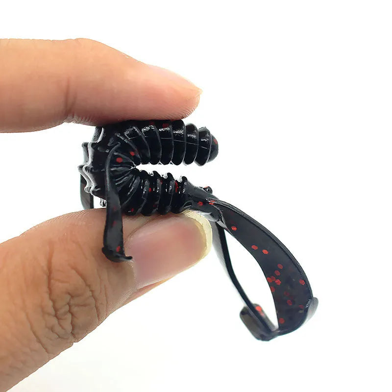 Soft PVC fishing lure artificial bait showing flexible construction and colour detail