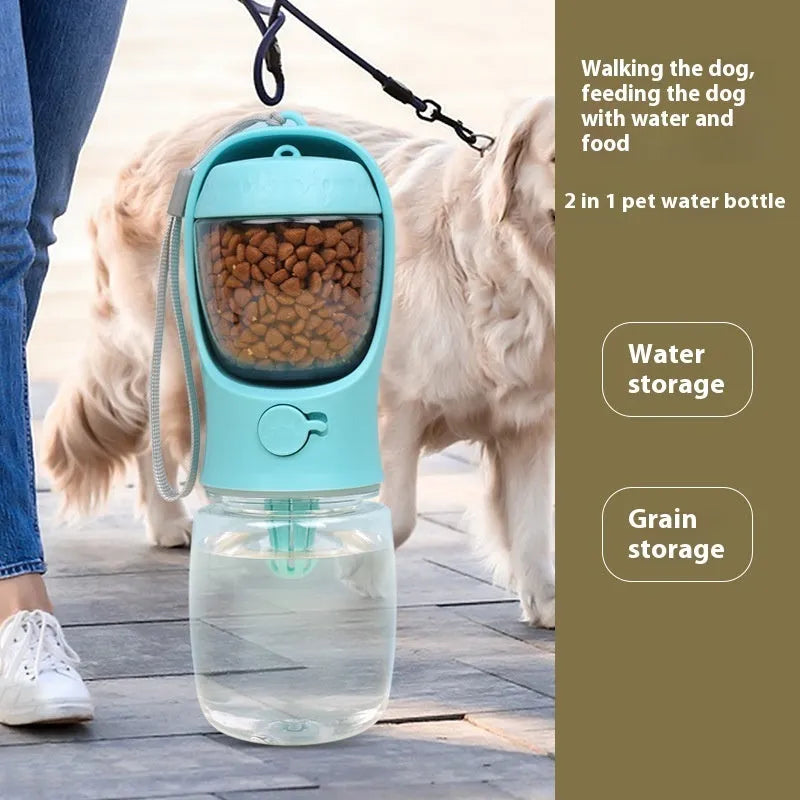 Blue plastic portable dog drinking cup with integrated food storage compartment for walks and travel