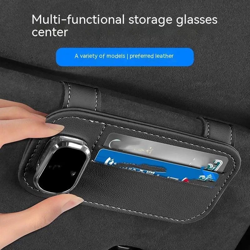 Leather car sun visor organiser with clip for sunglasses and card slot in beige colour.