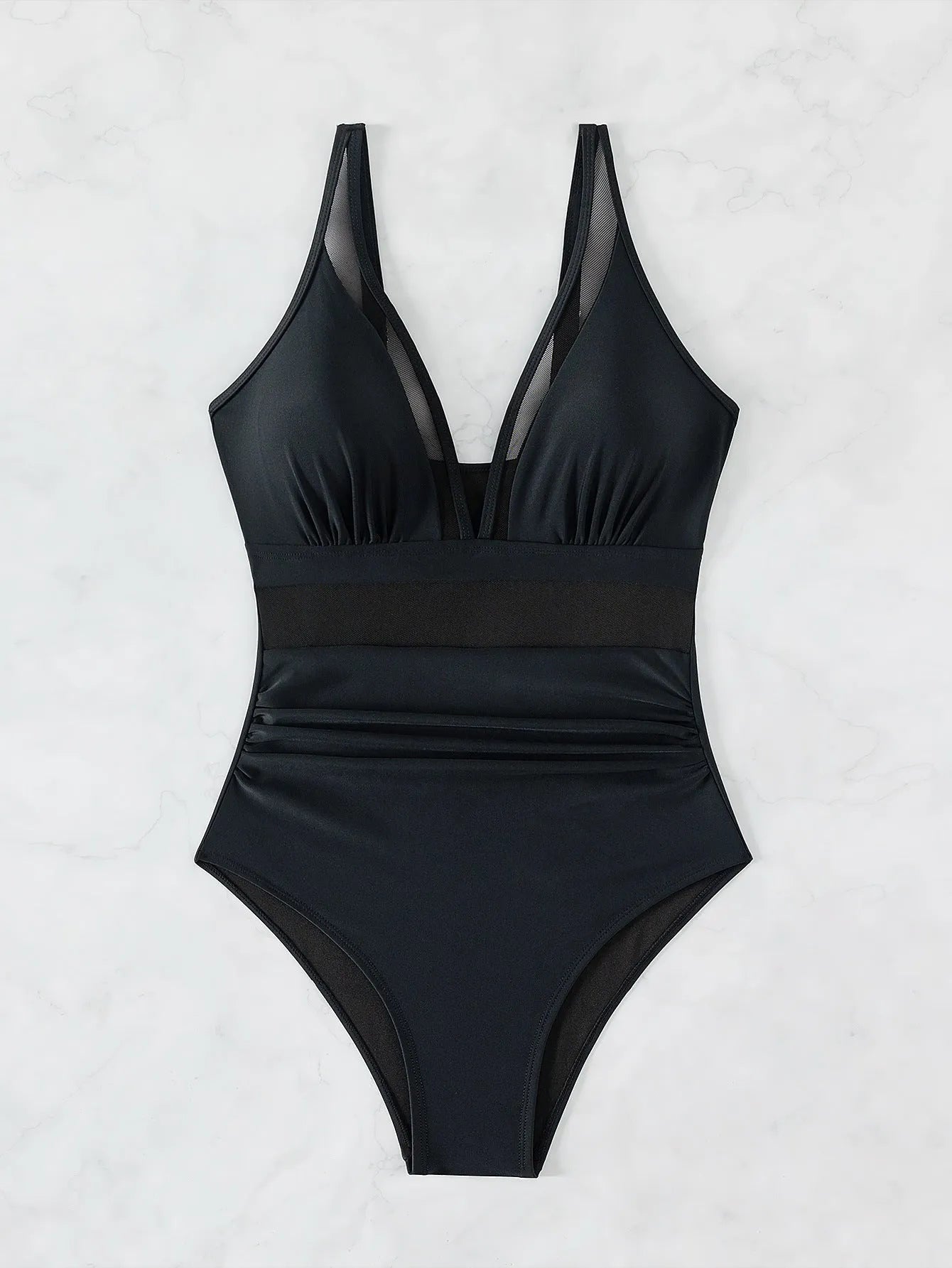 Black women's halter bikini one-piece swimsuit with mesh detailing and briefs style.
