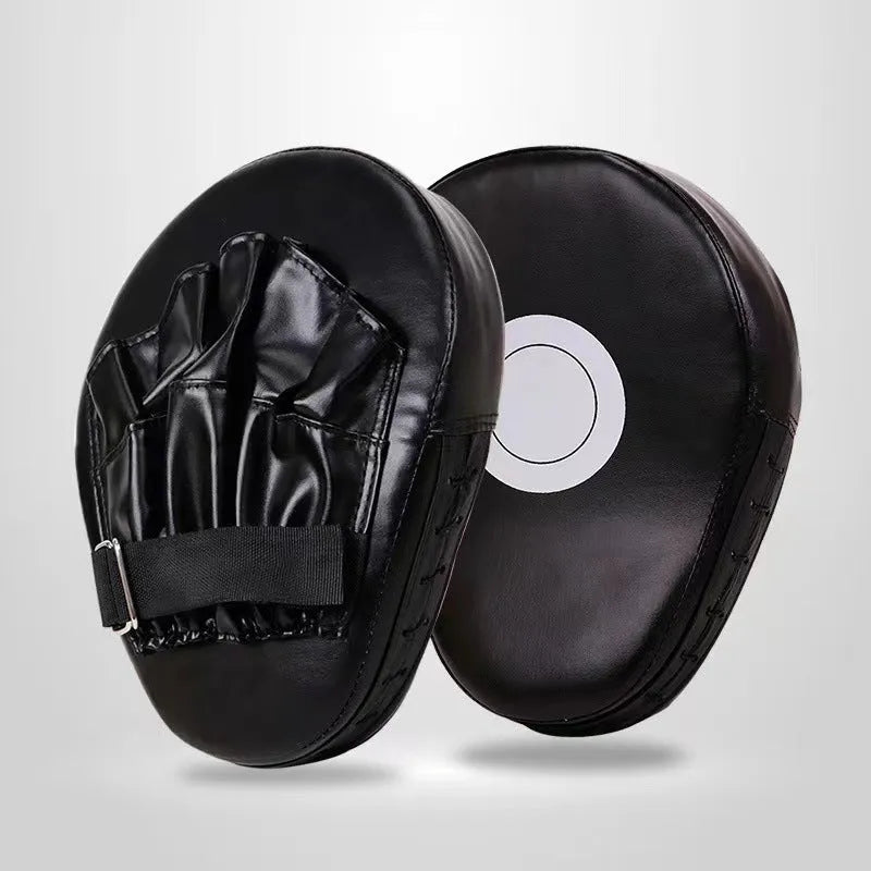 PU leather punch mitts for boxing training in curved and flat designs on a black background