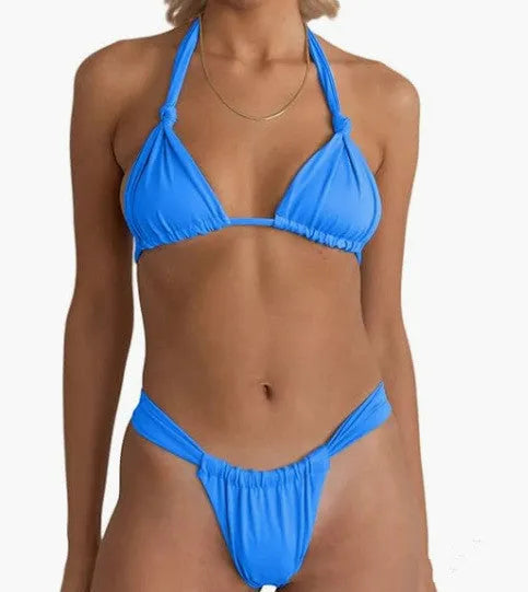 Women's pink pleated strap bikini with knot front and briefs bottom on mannequin