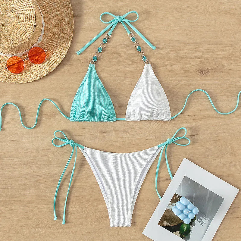 Women's colour matching lace-up swimsuit top and shorts with pearl chain detail