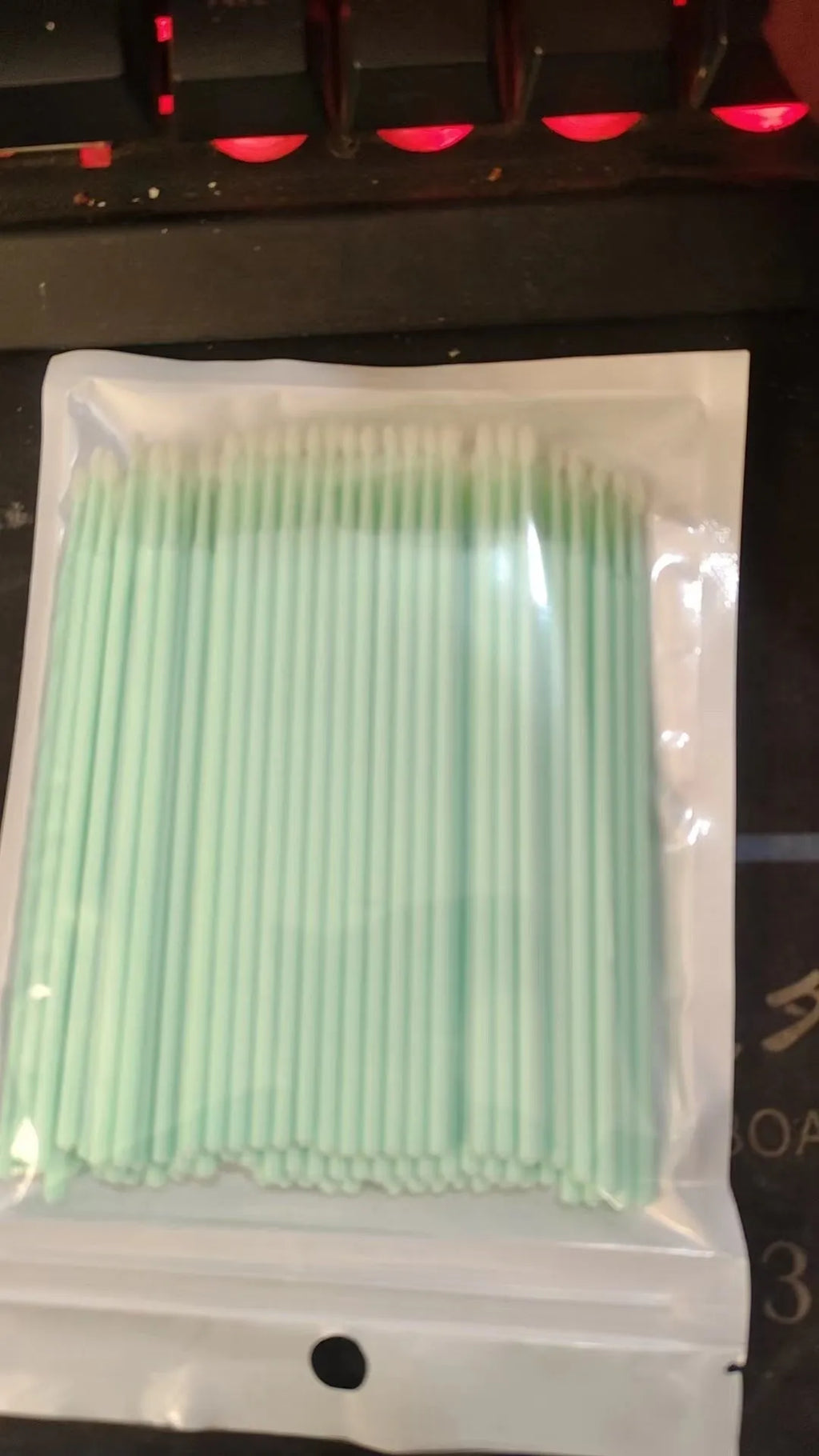 Disposable micro applicator brushes with coloured handles for eyelash extensions and makeup