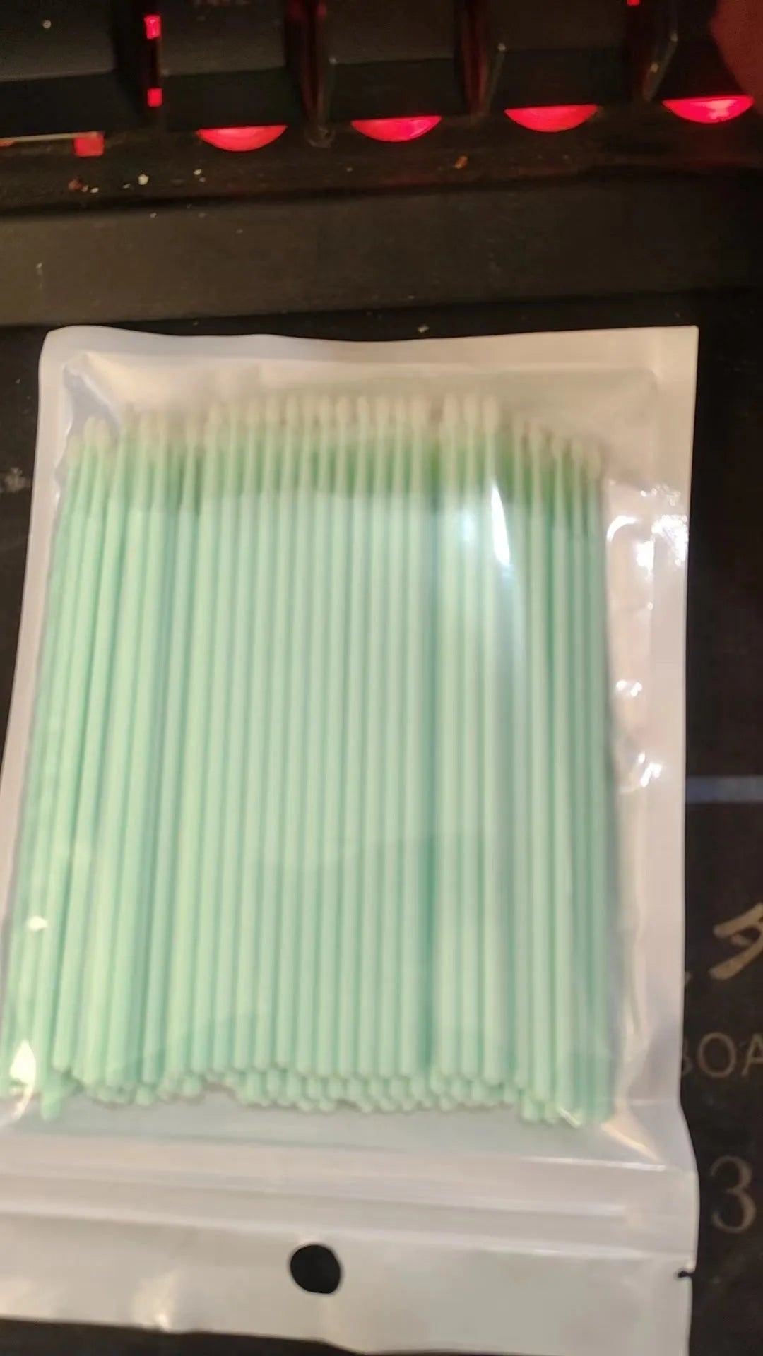 Disposable micro applicator brushes with coloured handles for eyelash extensions and makeup
