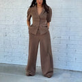 Brown men's slim fit polyester suit separates showing top and trousers
