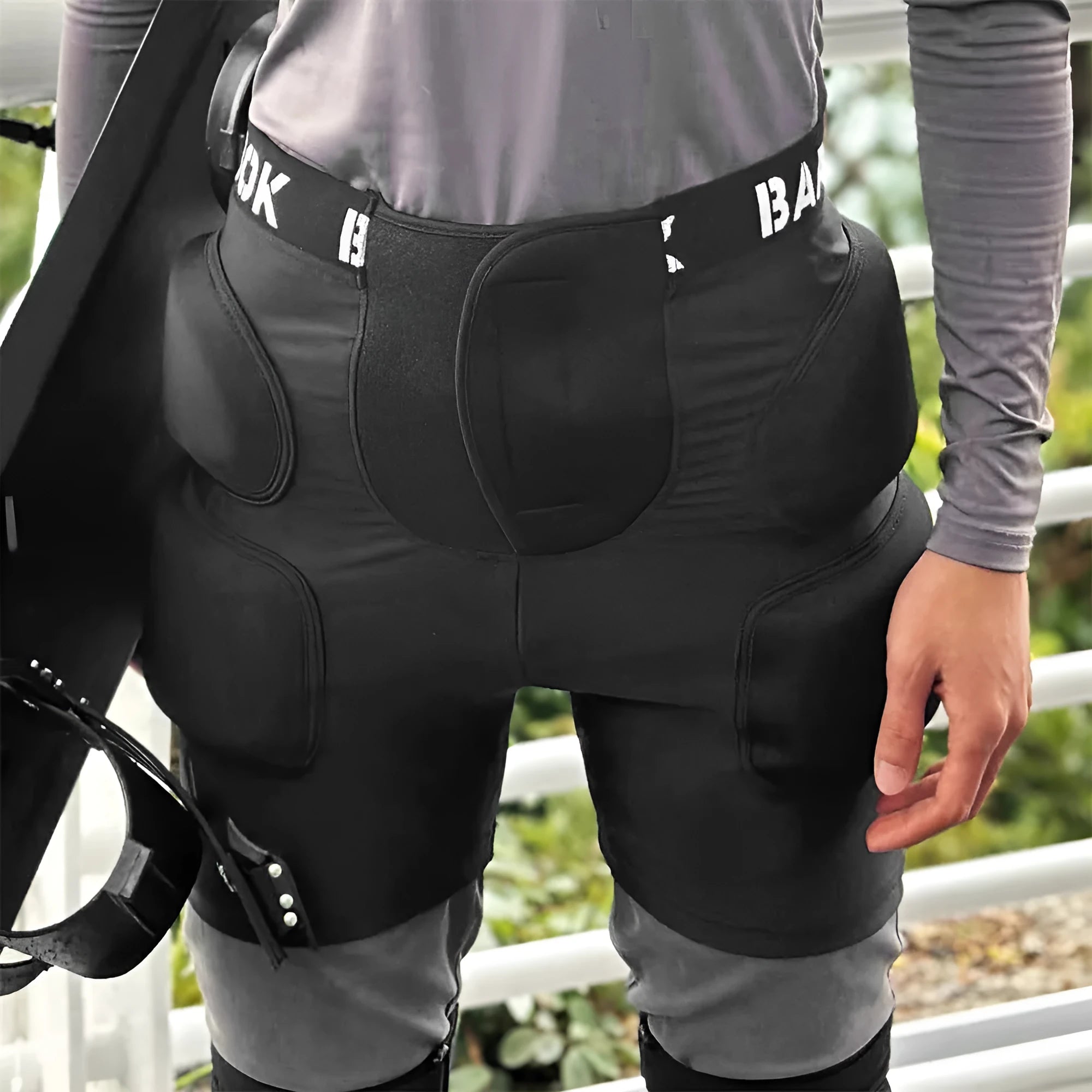 Black spandex hip protection pad with protective foam for skating and skiing.
