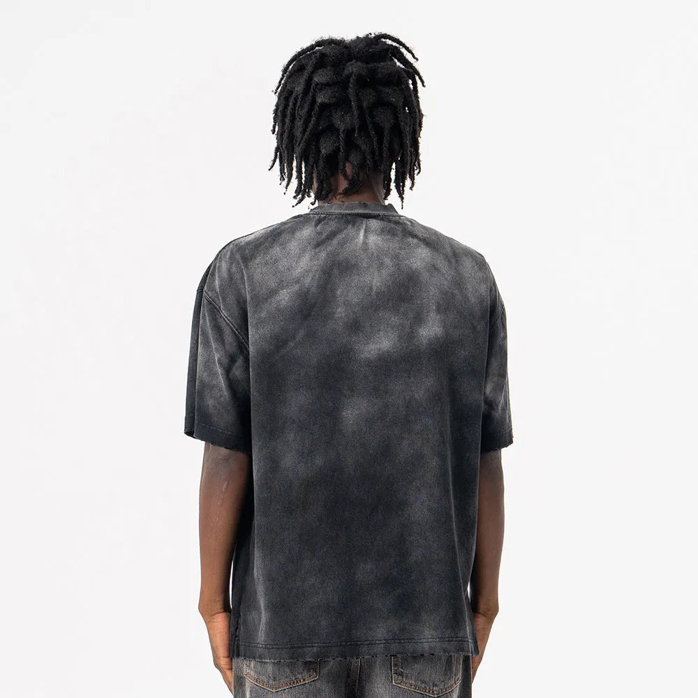 Black men's loose-fit cotton t-shirt with white letter printing on the chest.