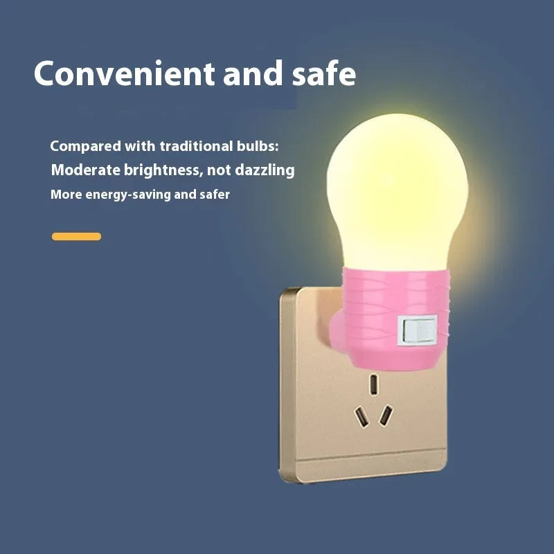 Plug-in bedside baby night light in white, blue, or pink shell with white or warm LED light.