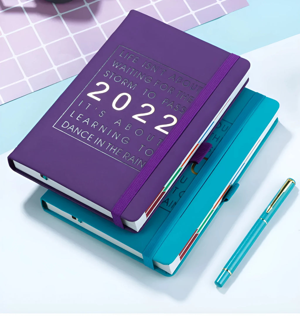 Imitation leather A5 notebook with French fold binding in red, purple, black, pink, sky blue, dark blue, and orange colour options