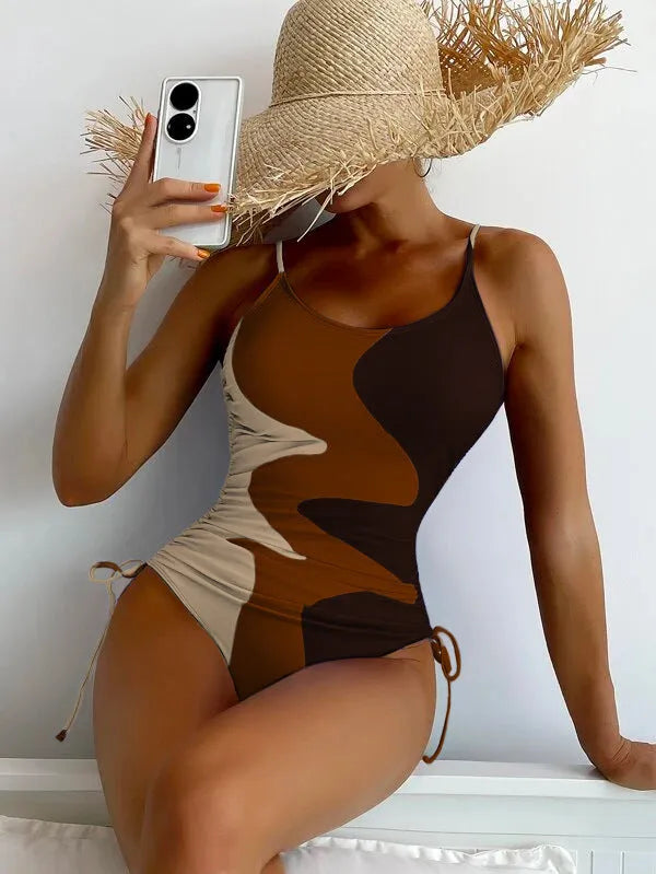 Women's sleeveless one-piece swimsuit in blue, purple, brown or green with fixed swimming trunks