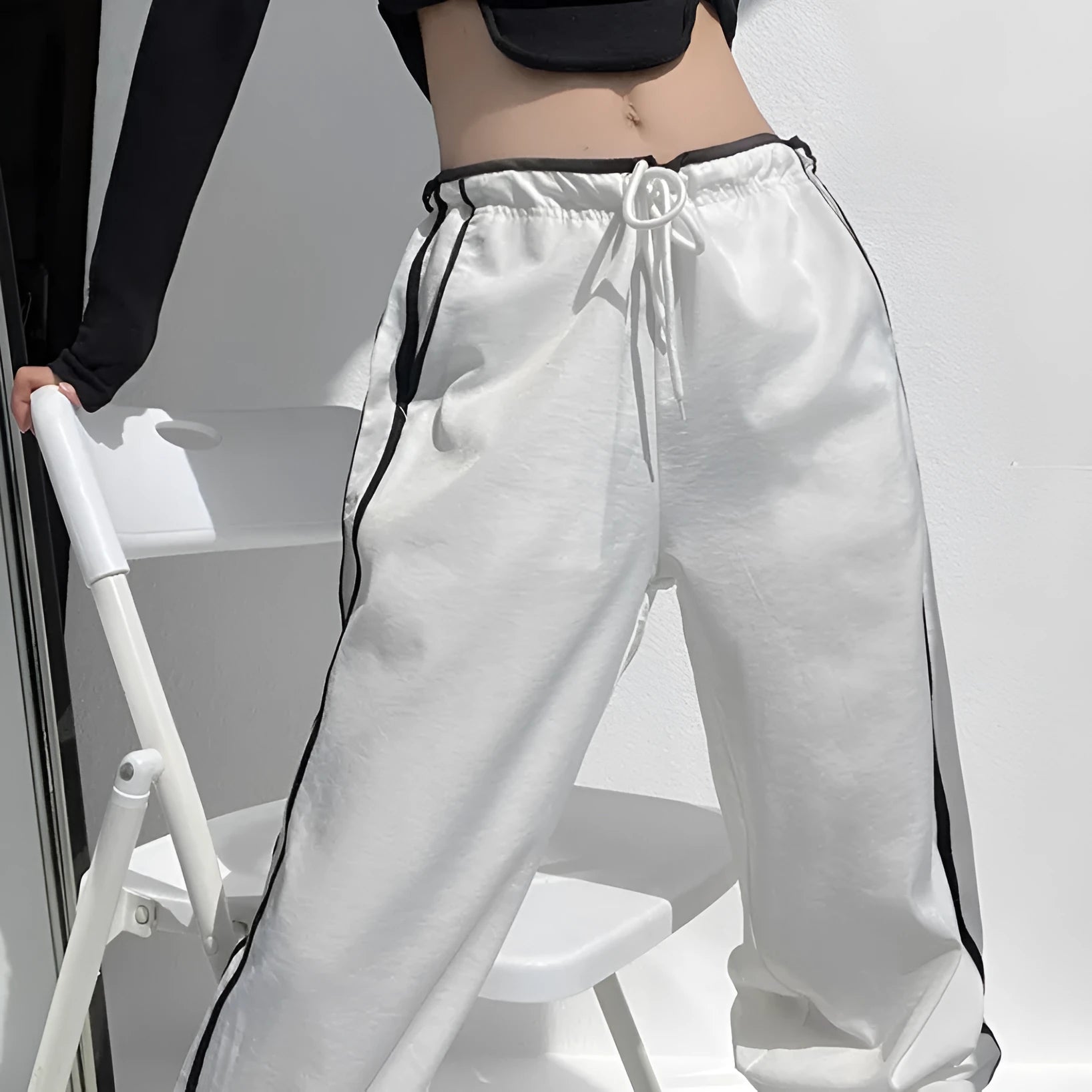Women's navy blue trousers with white contrast ribbon parallel bar detailing, low-waist straight-leg design