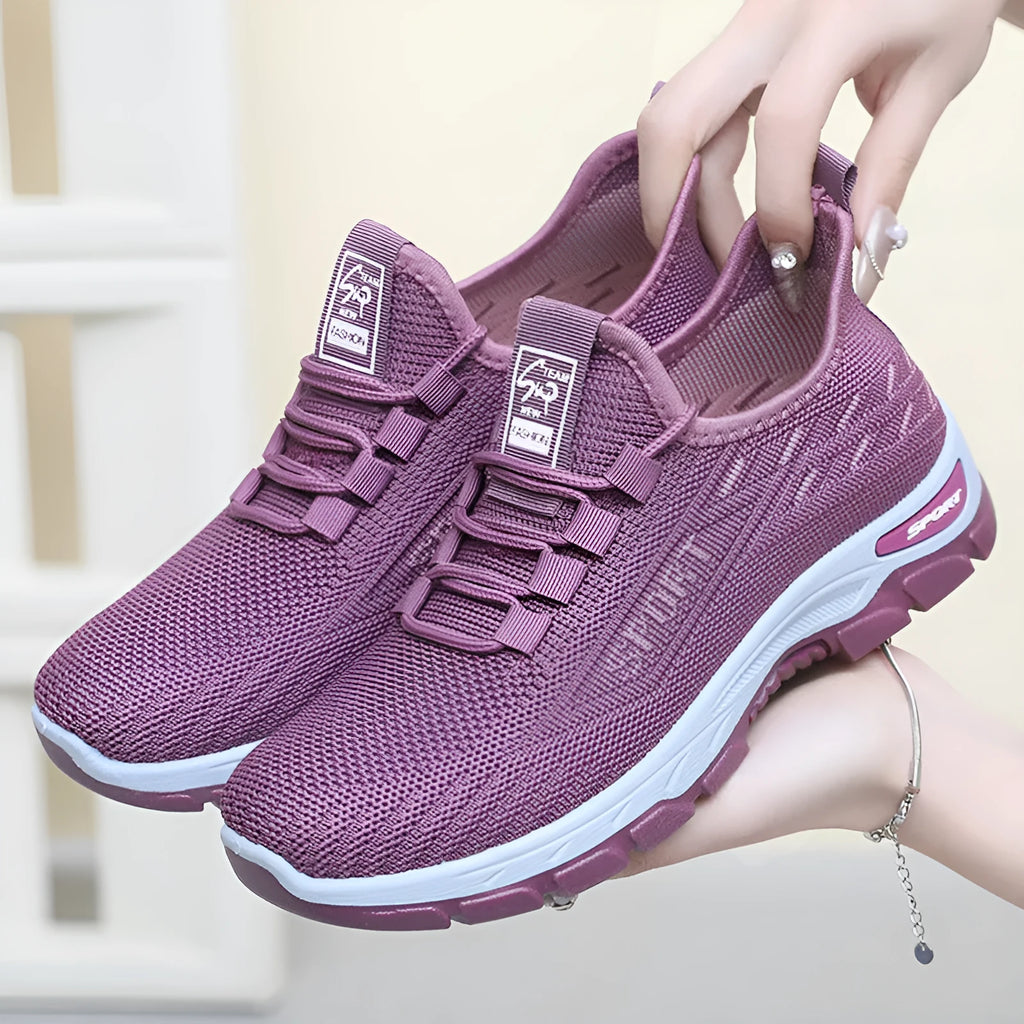 Low-top casual sneaker with a rounded toe and a lightweight PVC sole in multiple colour options.