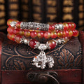 Handcrafted watermelon crystal bracelet with Chinese knot design in geometric shapes
