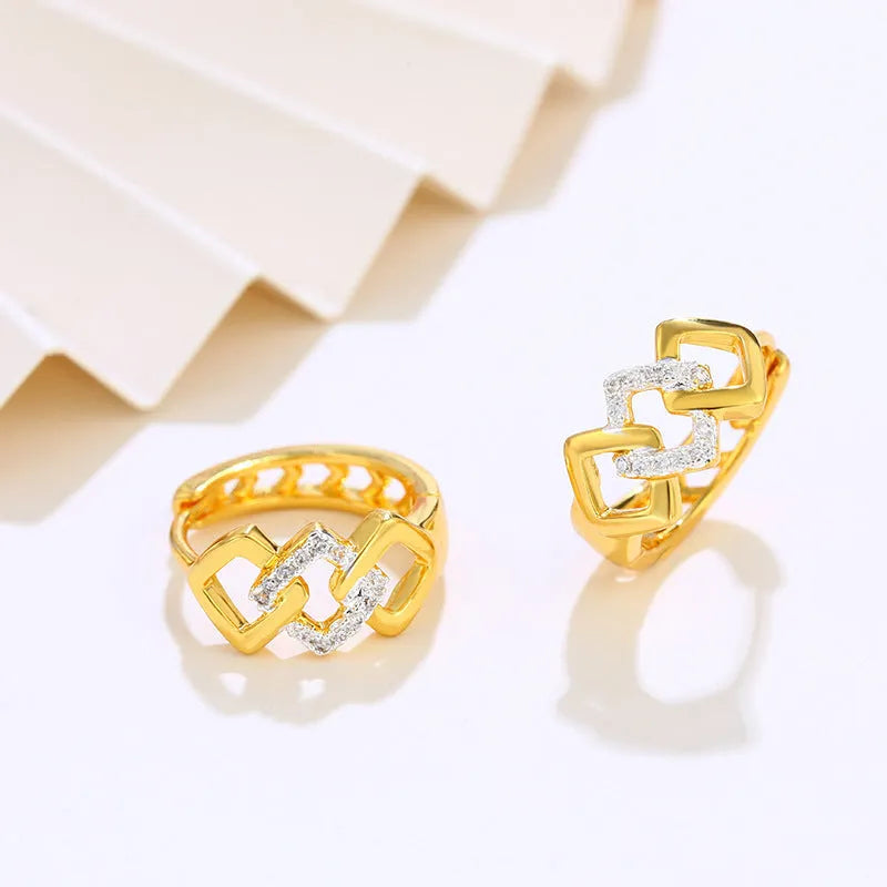 Gold hollow geometric alloy earrings with ear clip fastening