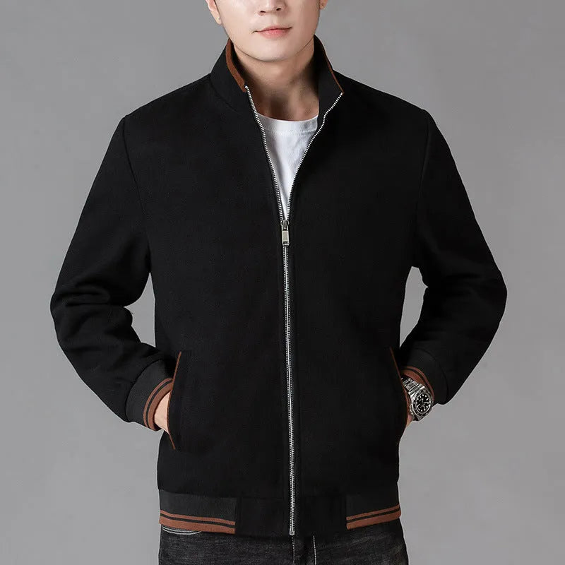 Men's grey sports-style fleece jacket with long sleeves and a zip chest pocket.