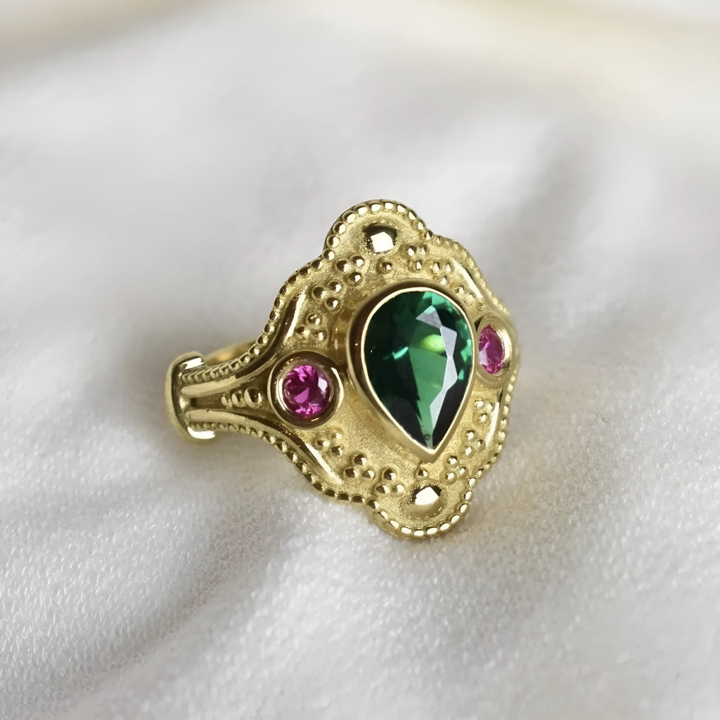 Women's geometric gold-plated ring with electroplated golden lvzuan finish shown from side view