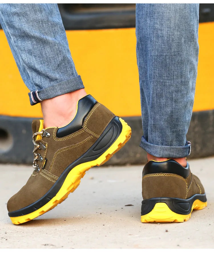 Bronze coloured cow suede leather safety boots with a steel toe cap on a non-slip sole.