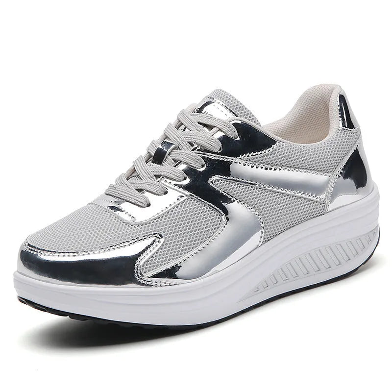 Women's fashionable thick bottom mesh elevator breathable shoes in gold colour with cross strap design