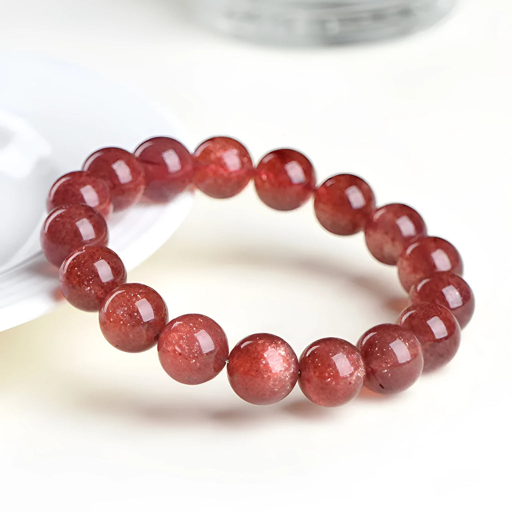Strawberry quartz geometric bead bracelet with natural starlight cherry red colour