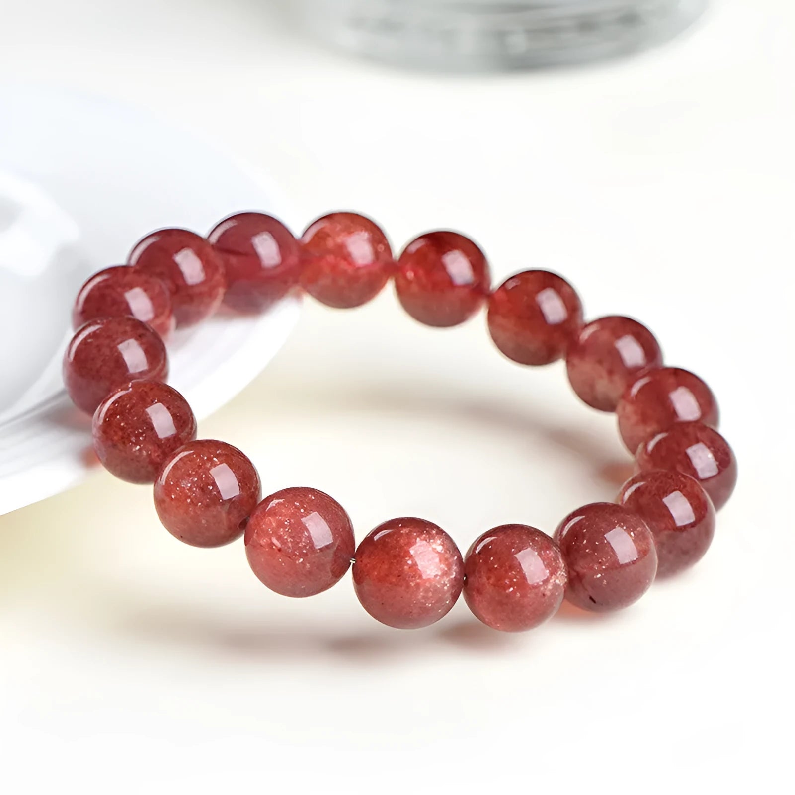 Strawberry quartz geometric bead bracelet with natural starlight cherry red colour