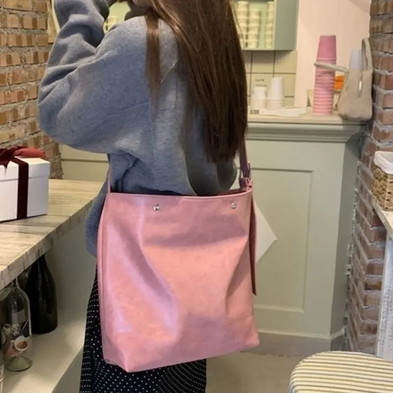 Corduroy one-shoulder commuter bag in pink or brown colour options
