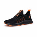 Men's black casual trainers with cross strap detail and Flying Weave upper material