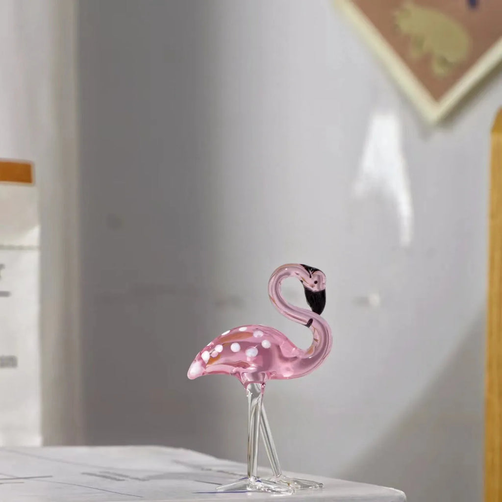 Pink crystal flamingo decorative ornament on table with modern minimalist style