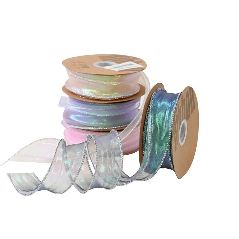 Roll of colourful fishtail yarn mesh decorative ribbon in 4cm width.
