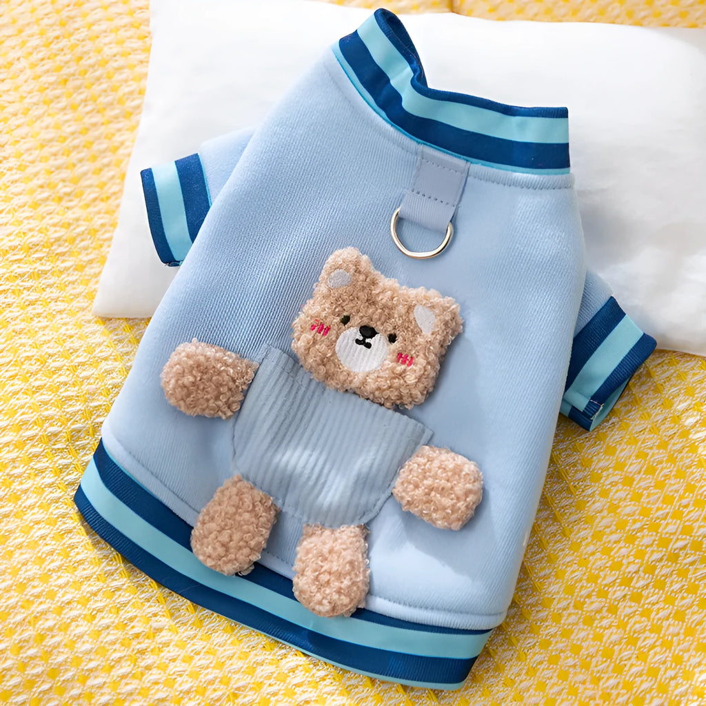 Navy blue wool dog sweater with light blue striped cuffs, metal D-ring on back, soft knitted fabric, for small breeds like Chihuahuas