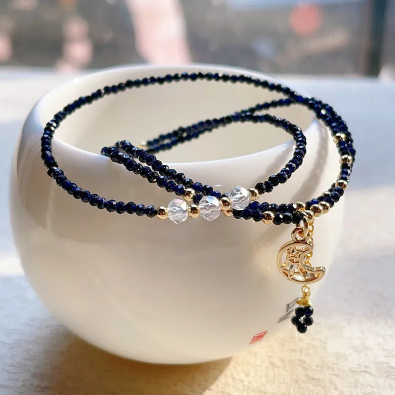 Blue sand stone three-ring bracelet with gold accents and adjustable closure
