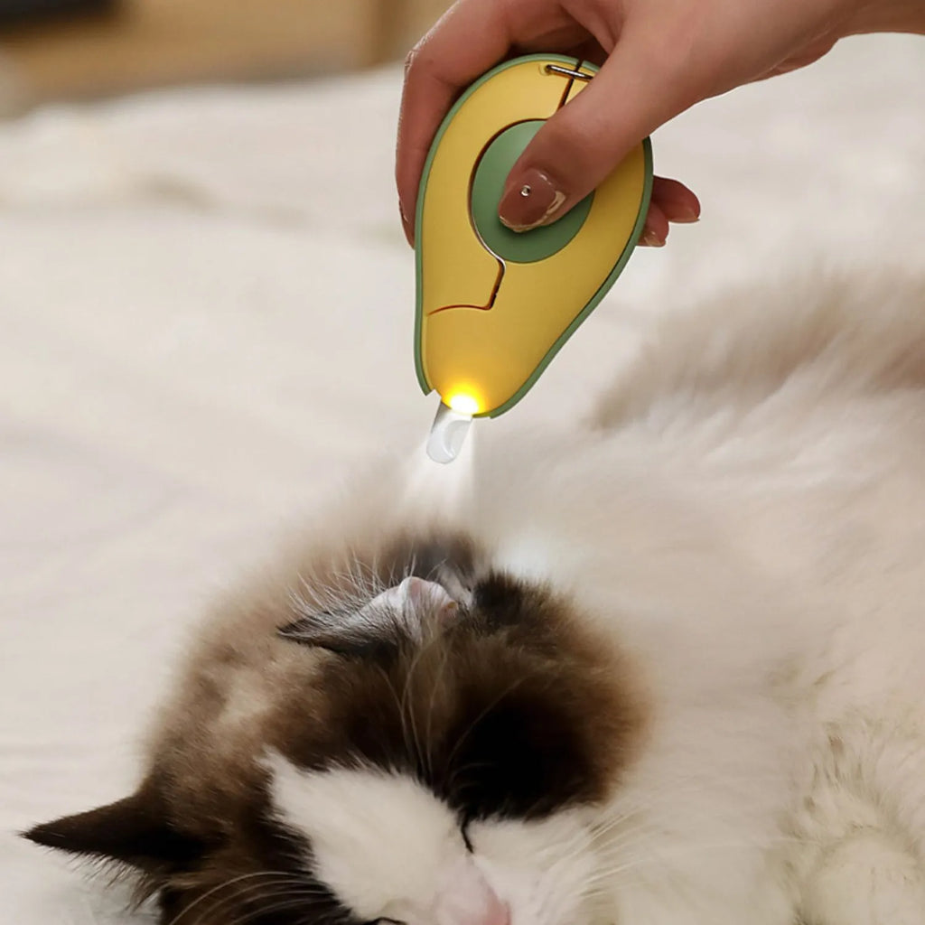 Green professional pet nail clipper with LED light and safety guard for small dogs and cats.