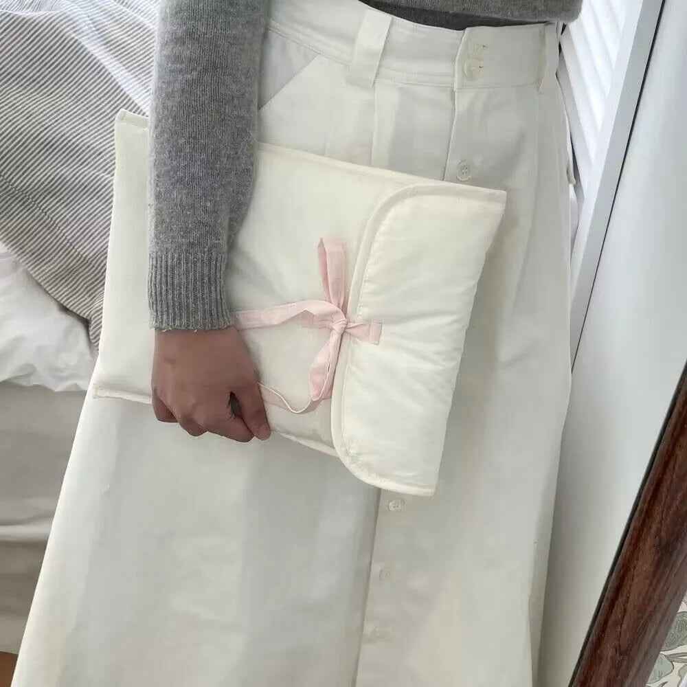 Women's black and white quilted nylon computer bag with ballet bow detail