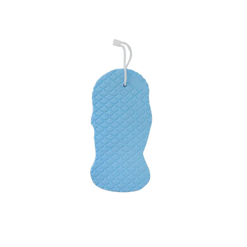 3D fish scale pattern bath sponge ball in assorted colours on a bathroom background.