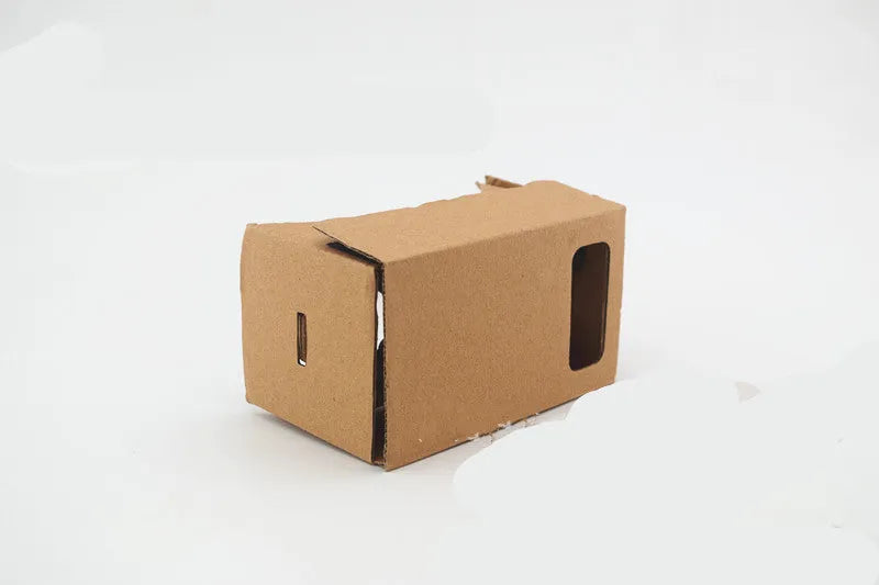 Pink and white cardboard VR glasses for smartphones with 3D lenses and magnet control