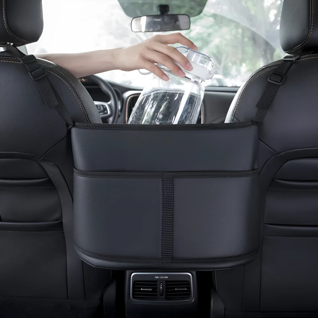 Black genuine leather car seat storage organiser with carbon fibre pattern measuring 38x24x15cm
