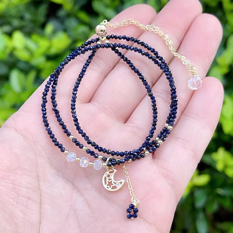 Blue sand stone three-ring bracelet with gold accents and adjustable closure