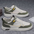 Men's Korean-style low top canvas board shoes in black with leather stitching detail on a white background.
