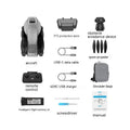 White folding quadcopter drone with camera, remote controller, batteries, and shoulder bag.