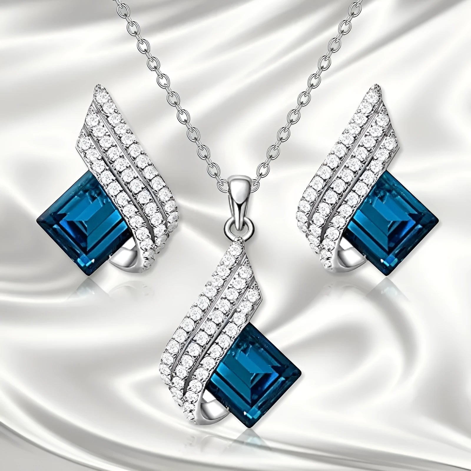 Women's necklace and earring set with glass pendant on cross chain, alloy material with electroplated finish