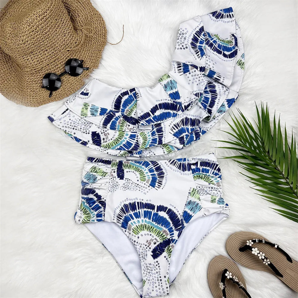 White women's one-shoulder swimsuit with double-layer lotus leaf skirt and high leg split design