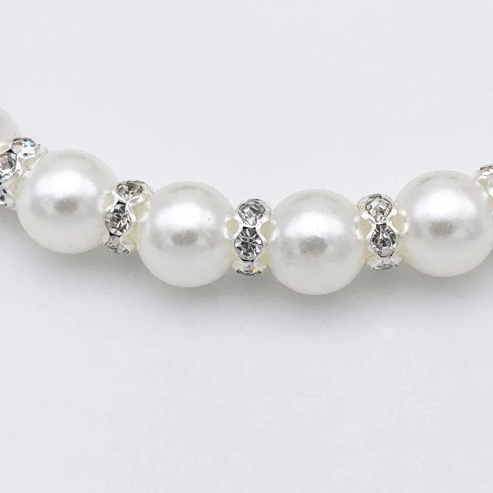 Adjustable dog necklace with imitation pearls, rhinestones, and ribbon bow for small pets