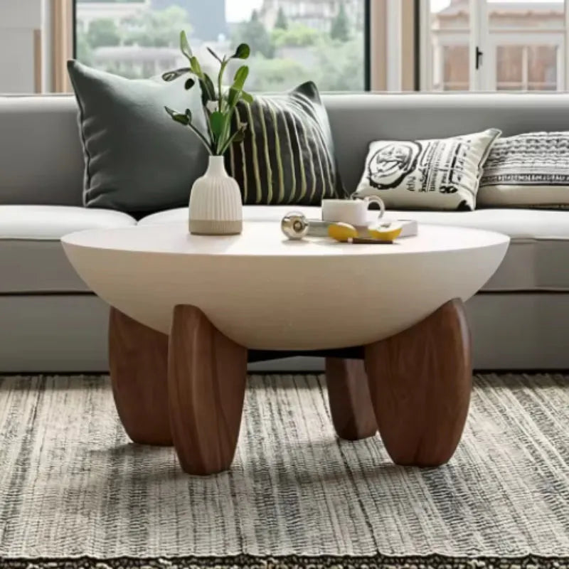 White solid wood coffee table with adjustable height feature and storage compartments