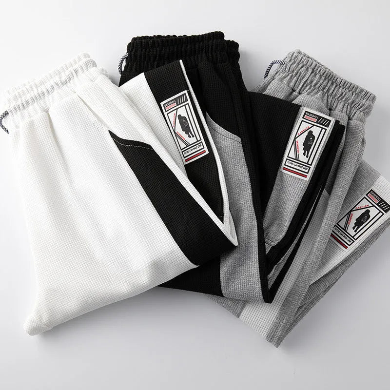 Men's casual wide leg fleece lined trousers in black, loose fit with drawstring waist