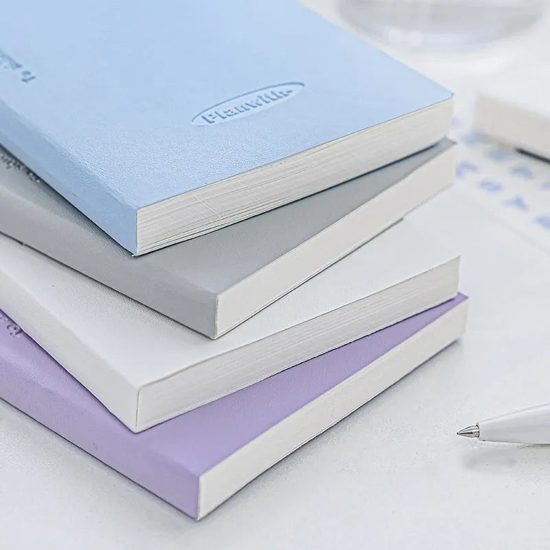 Embossed meter book open to show white pages, with blue cover option displayed.