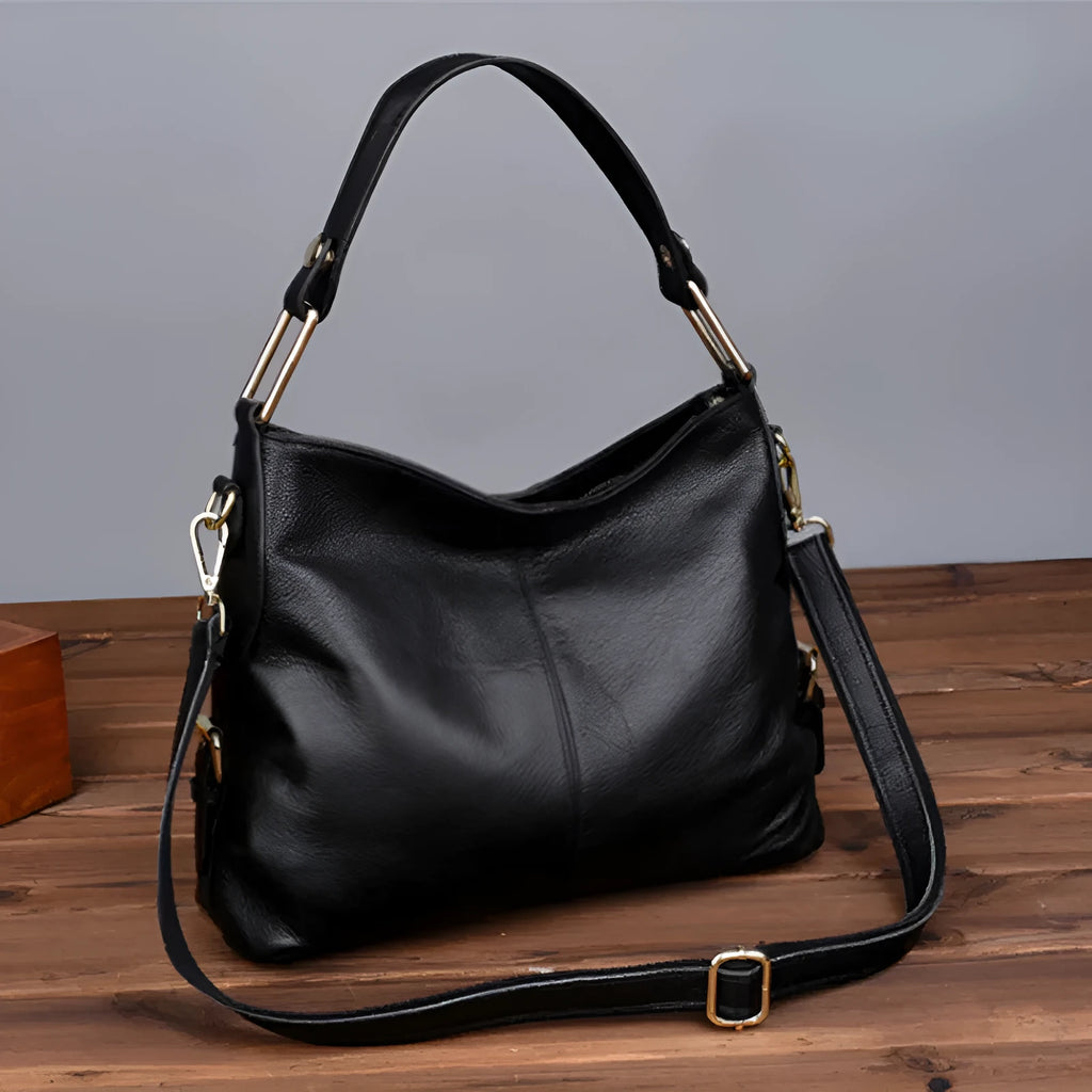 Genuine leather women's crossbody bag in vertical square shape with multiple zipper compartments