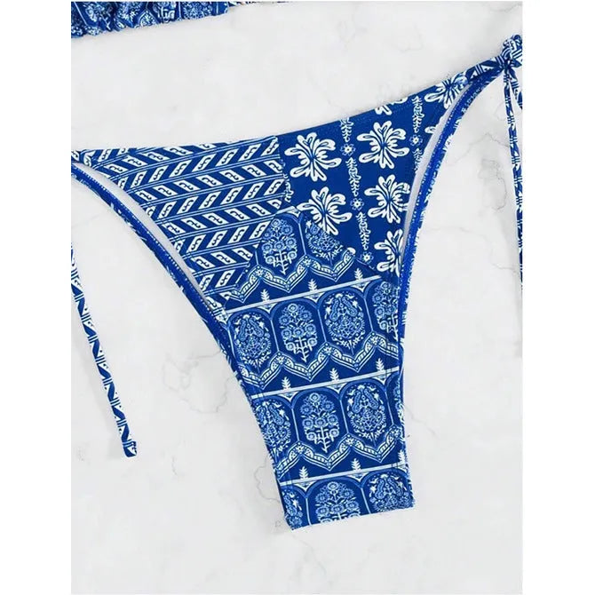 Women's green split bikini swimsuit with bandage-style printed stitching and briefs bottom.