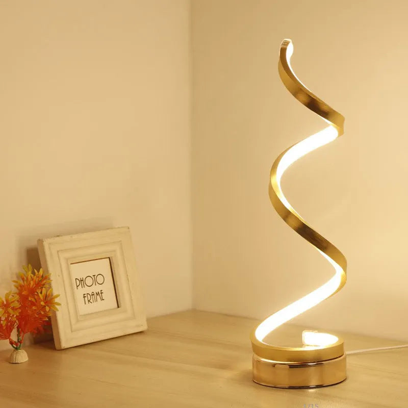Minimalist black and white LED bedside lamp with aluminium shade measuring 125x450mm