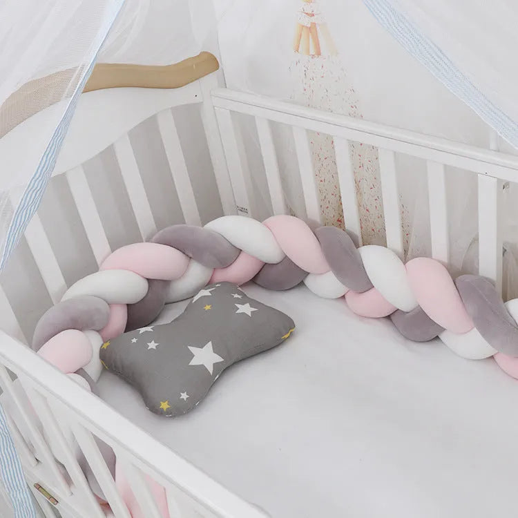 Braided knot baby crib bumper pillow in spandex velvet showing bendable design and colour options.