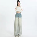Women's gradient blue straight-leg denim trousers with wide leg design showing colour transition effect